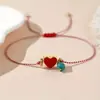 Pulsera de Cuerda Trenzada con Ojo de Diablo y Corazón de Turquesa Imitación, Estilo Nuevo Transfronterizo Europeo y Americano, Joyería de Mano Moderna y Versátil