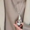Pendientes Espirales de Lirio de Calas Inspirados en Celebridades con Diseño Único, Nuevos Accesorios de Estilo Chino, Pendientes Irregulares de Alta Gama para Mujer