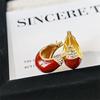 Pendientes geométricos de aceite rojo Ankola, pendientes retro Joker de moda, pendientes de temperamento de alta gama de nicho para mujeres, venta al por mayor
