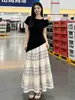 Traje de Mujer de Moda 2026 Nuevo Estilo Gama Alta Elegante Conjunto de Atuendo de Verano con Top Negro y Falda Blanca