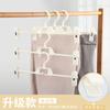 Estante para pantalones al por mayor estante de plástico para pantalones pinza para pantalones percha antideslizante para pantalones percha jk pinza sin costuras para colgar pantalones pinza para faldas pinza para pantalones