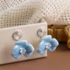 Aretes de Clip para Oreja con Esmalte Azul Goteante Flor Floreciente Zircón Disco para Mosquiteros Pendientes Elegantes de Viajero de Nicho Exquisitos y Versátiles