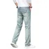 Jeans retro de alta gama para hombre de color claro para primavera, corte recto y holgado, nuevos pantalones para hombre elásticos lavados estilo primavera y otoño 2026
