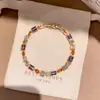 Pulseira pingente geométrico de flor de zircônia cúbica estilo europeu e americano, elegante e versátil, uma peça de joalheria delicada e luxuosa com um toque de alta qualidade, um acessório único e estiloso para mulheres