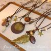 Nuevo collar de plumas largas zen chino para mujer, estilo étnico, con cadena de lana superpuesta, accesorios bohemios para otoño e invierno.