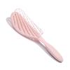 Peine de masaje para el cabello de material ligero de color caramelo con costillas huecas de sarga de pintura elástica punto