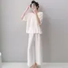 Novo Estilo de Roupa de Casa para Mulheres 2026, Conjunto de Verão Liso, Pijama Casual com Gola Redonda, Pijama Colorido Doce Atacado (Xin)