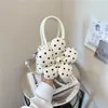 Bolso de mano de moda transfronterizo con lunares frescos, bolso tipo concha versátil de diseño nicho y moderno, bolso cruzado casual dulce con estampado floral