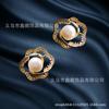 Corea del Sur nuevos aretes de botón de temperamento de perla natural simple S925 aguja de plata micro incrustados circonita moda exquisitos aretes de pétalo