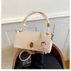 Bolso coreano de nicho, nueva moda otoño 2026, bolso cruzado de color sólido texturizado, bolso de mujer simple y elegante