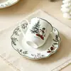 Conjunto de louça de cerâmica de Natal estilo floresta com tema de inverno, apresentando designs de boneco de neve, rena e florais, incluindo pratos, tigelas e xícaras de café, perfeito para uso festivo em casa