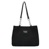 Bolsa feminina de veludo de grande capacidade 2026 nova moda simples texturizada acessível ombro tote para o dia a dia