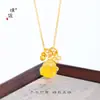 Colar Ganesha Bebê Flor de Quatro Folhas Âmbar Dourado Antigo Design de Nicho Corrente Versátil para Clavícula da Loja de Ouro Puzuo