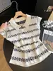 Novo estilo de cardigã de tricô fino de verão feminino com gola virada, design vazado e cores contrastantes, feito de camiseta de linho de bambu de manga curta 13270