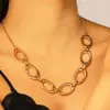 Conjunto de Joyería Metálica Geométrica Hueca Más Vendido Transfronterizo, Pendientes Ovalados Simples y Elegantes, Collar y Pulsera Juego de Tres Piezas