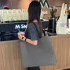 Bolsa Não Tecida Sacola de Loja de Roupas Bolsa para Roupas Femininas Fita de Embalagem Sacola de Compras Atacado Cinto de Presente