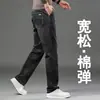 Pantalones de mezclilla de alta gama en color azul grisáceo para hombre, nueva colección primavera/otoño 2026, pantalones casuales de corte recto holgado, modernos y versátiles