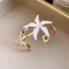 Pulseira Aberta de Metal Esmaltado Estrela-do-Mar Transfronteiriça Europeia e Americana Moda Retrô Temperamento Pulseira de Luxo Leve Toque de Alta Qualidade Joia de Mão para Mulheres