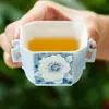 Taza de té pequeña de doble asa Zui Mo Blue Gardenia del fabricante, taza de té personal de cerámica para uso doméstico, juego de té Kung Fu