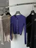 Recomendação PrincipalCardigã de Tricô Simples Ajustado Curto Yuran 26 Primavera/Verão Novo com Fivela de Metal Canelada