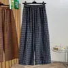 Foto real de elegantes pantalones de pierna ancha a cuadros con cintura elástica para mujer, nueva moda de otoño, pantalones rectos casuales holgados