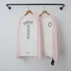 La camiseta de manga larga con estampado sánscrito y patchwork CH Chrome Hearts 26SS, nueva para primavera-verano, es un éxito en el comercio exterior transfronterizo al por mayor.