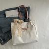 Bolsas al por mayor transfronterizas de alta gama y gran capacidad 2025 Nueva textura a la moda de un hombro versátil para ir al trabajo