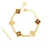 Tienda de Oro Mismo Estilo Chapado en Oro Incrustado de Diamantes Piedra Ojo de Tigre Trébol de Cuatro Hojas Conjunto de Collar, Pulsera y Aretes, Lujo Ligero, Sensación de Gama Alta, Versátil