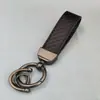 Chaveiro de Carro com Padrão de Fibra de Carbono de Alta Qualidade Transfronteiriço Pingente Criativo Moda Masculina Cordão de Couro Negócios Chaveiro Atacado