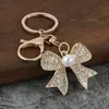 Presentes Criativos Cheios de Diamantes e Laços Pingente para Chaveiro de Carro Bolsa Elegante para Senhoras Chaveiro Elegante Pronto para Venda