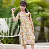 Saia de Suspensório para Meninas Verão 2025 Novo Estilo Infantil Férias Floral Praia Saia Vestido de Verão para Meninas