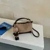 Nova Bolsa de Axila de Camurça Outono/Inverno 2025 Bolsa de Mão de Viagem de Alta Qualidade Bolsa Dumpling Bolsa Transversal Bolsa Feminina Bolsa de Mão Bolsa de Ombro