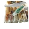 Venta al por mayor de fábrica transfronteriza superventas grava de cristal natural mineral cosméticos de alta gama bola tapa de madera botella de aceite