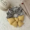 [Foto real] Elegante algodón raya de lazo amarillo anillo para el pelo de intestino grueso temperamento de moda retro cuerda para el pelo dulce nueva