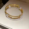 Pulseras Abiertas Europeas y Americanas con Perlas Incrustadas de Diamantes para Mujer, Pulseras de Diseño de Nicho Exagerado a la Moda, Joyería de Lujo Ligero y de Alta Gama al por Mayor