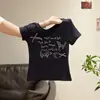 Camiseta de Manga Corta con Cuello Redondo Estampada Color Blanco Crudo Hombro Normal para Mujer 2026 Verano Ajuste Delgado Favorecedor Nudo de Lazo Top Corto Chica Picante