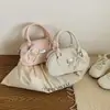 Bolso de bowling retro de nicho, bolso de mano para mujer, nueva colección otoño 2026, bolso de hombro simple, bolso cruzado, bolso Boston