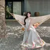 Vestido Estampado Resistente Estilo Palácio Retrô para Mulheres, Novo Modelo de Verão 2026, Vestido de Praia Deslumbrante e Elegante