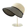 Sombrero de paja a rayas de verano transfronterizo, sombrero de ala ancha para mujer, sombrero de paja elegante para protección solar, sombrero de playa, sombrero tejido