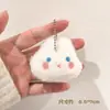 Colgante de peluche juguete pequeño llavero decoración de bolso restaurante llave de coche regalo pequeño regalo de graduación