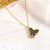 Popular Set de Pendientes Doble Cara de Mariposa con Acabado Dorado, Diseño de Nicho, Acero de Titanio Nácar, Collar y Pulsera de Alta Gama Transfronteriza 18K