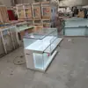Mostrador de teléfono móvil productos de vidrio personalizados fabricante vitrina comercial gabinete de pared de madera gabinete de hierro con pintura horneada partición de rincón de joyería