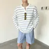 Suéter de punto con cuello Henley, jersey de manga larga a rayas hueco para hombre, estilo fino de otoño e invierno, venta al por mayor de fábrica transfronteriza