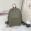 Mochila ultraligera, modelo nuevo 2026, mochila de lona de nailon de alta gama para nicho, para el trabajo, los desplazamientos y los viajes, pequeña y ligera
