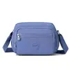 Bolsa Transversal Feminina 2025 Inverno Novo Estilo Múltiplos Bolsos Bolsa de Ombro Simples Resistente à Água Nylon Pequena Bolsa