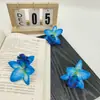 Venta al por mayor de fábrica Venta caliente transfronteriza Flores artificiales Orquídeas tailandesas Sombreros de flores Zapatos con flores Tocados festivos Flores para la cabeza Flores falsas