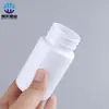 Venta al por mayor de fábrica Botellas de plástico de 80 cc para tabletas Embalaje separado a prueba de luz Botellas de plástico blanco engrosado Botellas de embalaje separado para caramelos