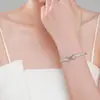 Pulseira de Prata Esterlina S925 Estilo Novo com Laço para Mulheres Europeias e Americanas, Design Moderno de Alto Padrão, Pulseira em Forma de Oito, Joia Elegante para Mão