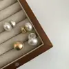 Pendientes de diseño ins de nicho aleación cepillada dos pendientes mujer 2024 nuevo temperamento pendientes de perla