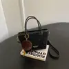 Bolso de mano de leopardo de corte relajado, bolso tipo cubo nuevo para mujer 2026, moda coreana moderna, bolso de hombro y bolso cruzado únicos
